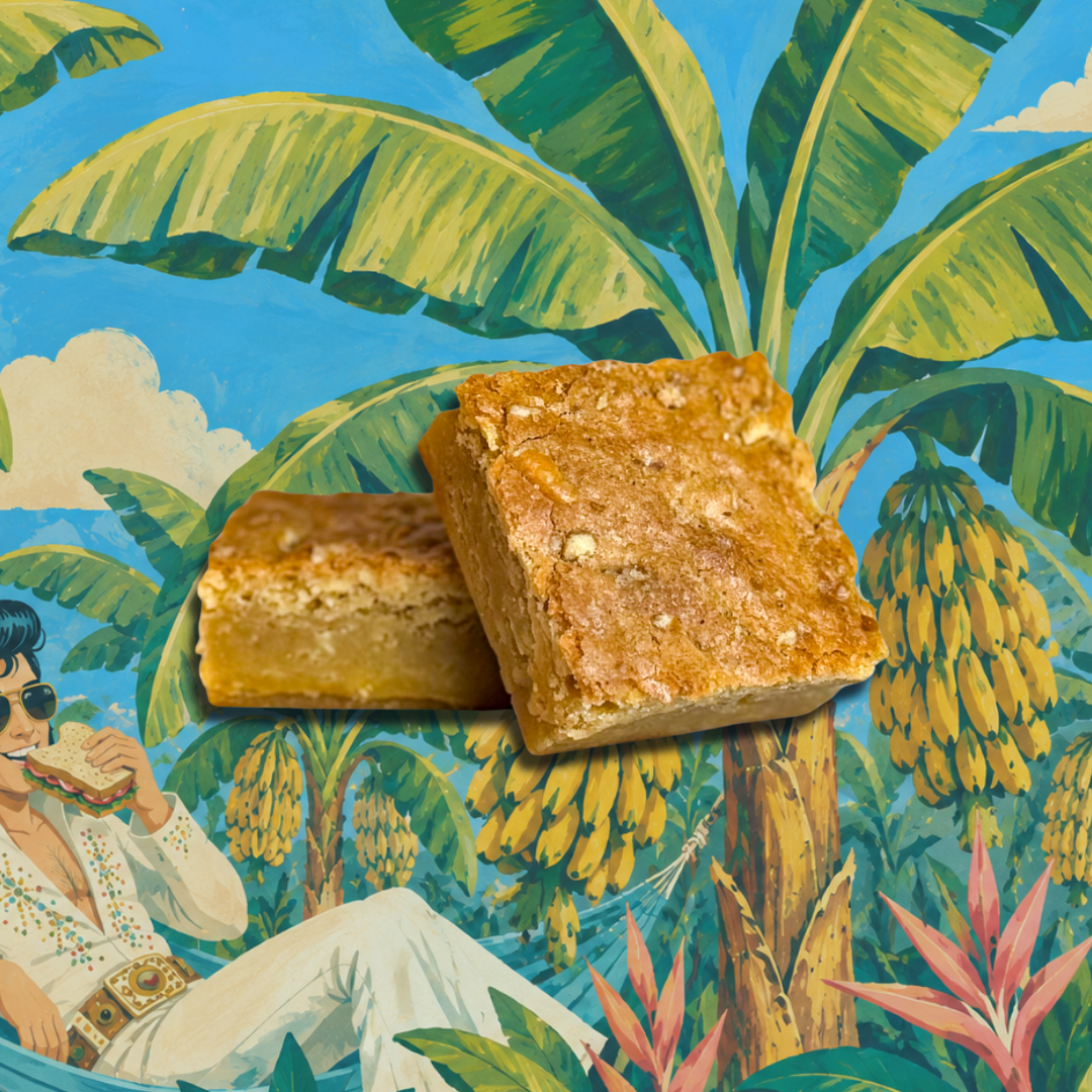 Two square golden-brown banana brownies with a crumbly texture, stacked on top of each other against a vibrant tropical illustration featuring palm trees, bananas, and a lounging man.